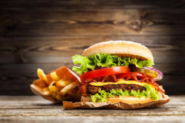 Delicious burger and fries at Batatas Fritas E Hamburguer Delicioso