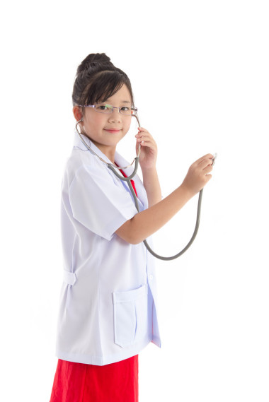 美麗的亞洲女孩在醫(yī)生制服圖片