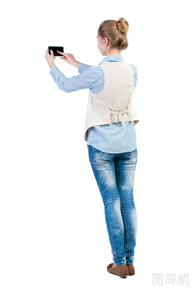 使用移動電話的婦女圖片