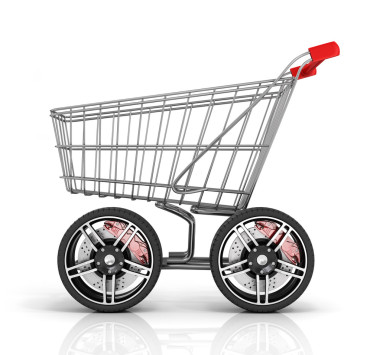 与大车轮在白色背景上的购物车。快速 s