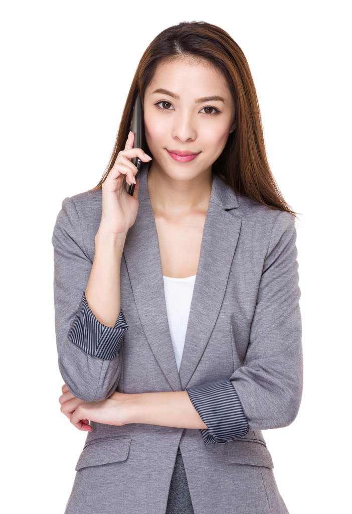 在商务套装的年轻亚洲女商人图片 在商务套装的年轻亚洲女商人图片