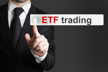 推觸摸屏按鈕 etf 交易的商人