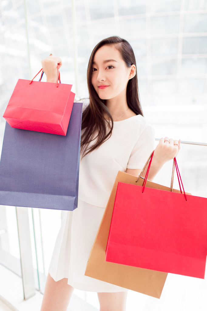肖像年轻成人女孩彩色袋