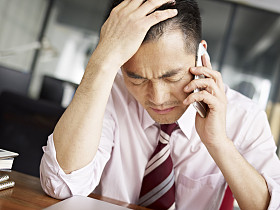 沮丧的亚洲业务人