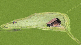 绿色的田野、 房子和割草机图片