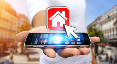 商人用现代手机租一个公寓