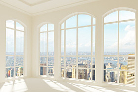 宽敞明亮的现代房间，与城市景