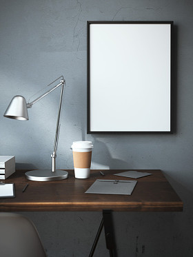 工作场所与杯和空白帧。3d 渲染