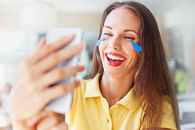 Woman with emoticon tears