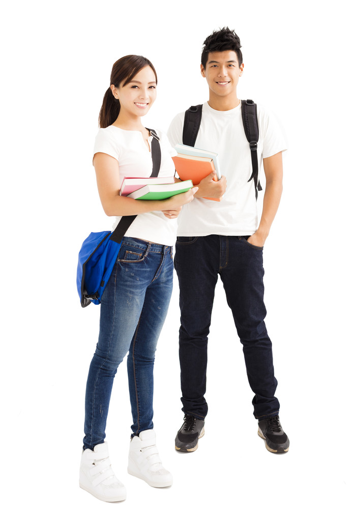 快乐的年轻学生夫妇与书  快乐的年轻学生夫妇与书