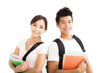 快乐的年轻学生夫妇与书 图片