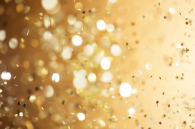 圣誕黃金背景。黃金假期，發(fā)光的抽象上