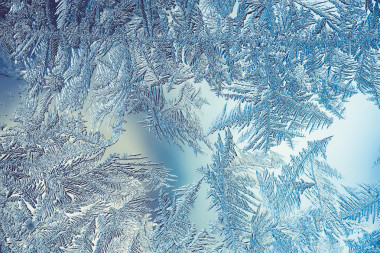 美麗的特寫冬天結(jié)冰霜紋彩色背景