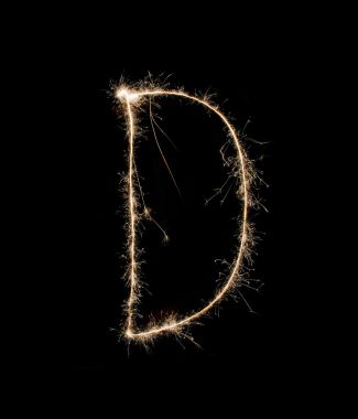 在黑色背景上的字母 D