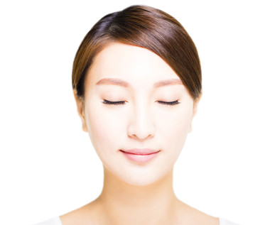  美麗年輕的亞洲女人臉特寫圖片
