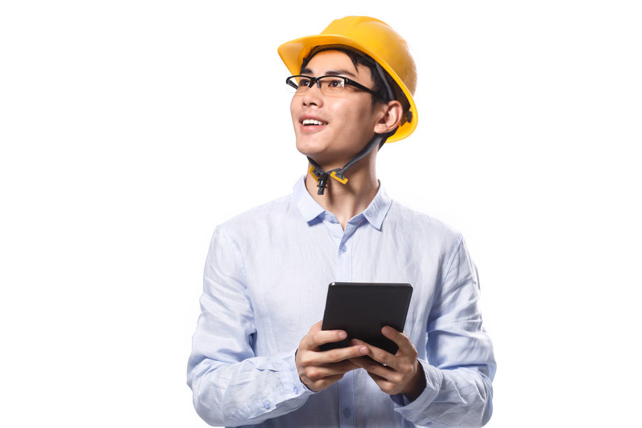 商务青年男人戴着安全帽 商务青年男人戴着安全帽