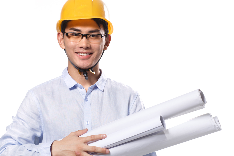 商务青年男人戴着安全帽图片