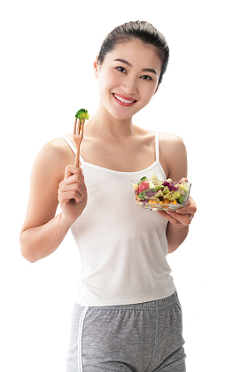 青年女人吃沙拉图片
