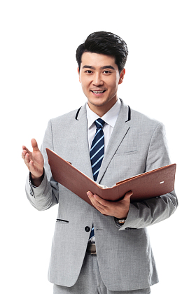 拿着文件的商务男士图片
