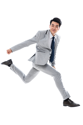 奔跑跳跃的商务男士图片
