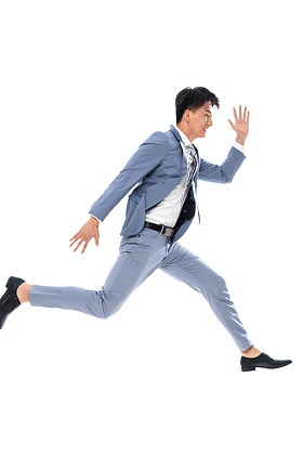 奔跑跳跃的商务男士图片