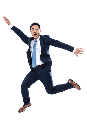 欢呼跳跃的商务男士照片