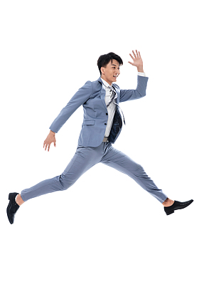 奔跑跳跃的商务男士图片