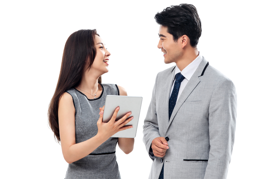 拿平板电脑的商务人士图片