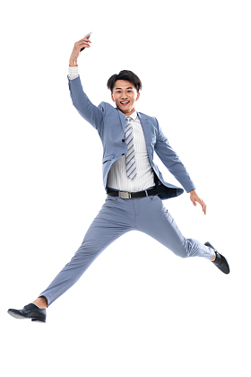 拿着手机奔跑跳跃的商务男士图片