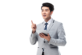 拿平板电脑的商务男士图片