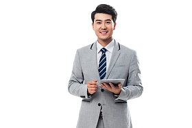 拿平板电脑的商务男士图片