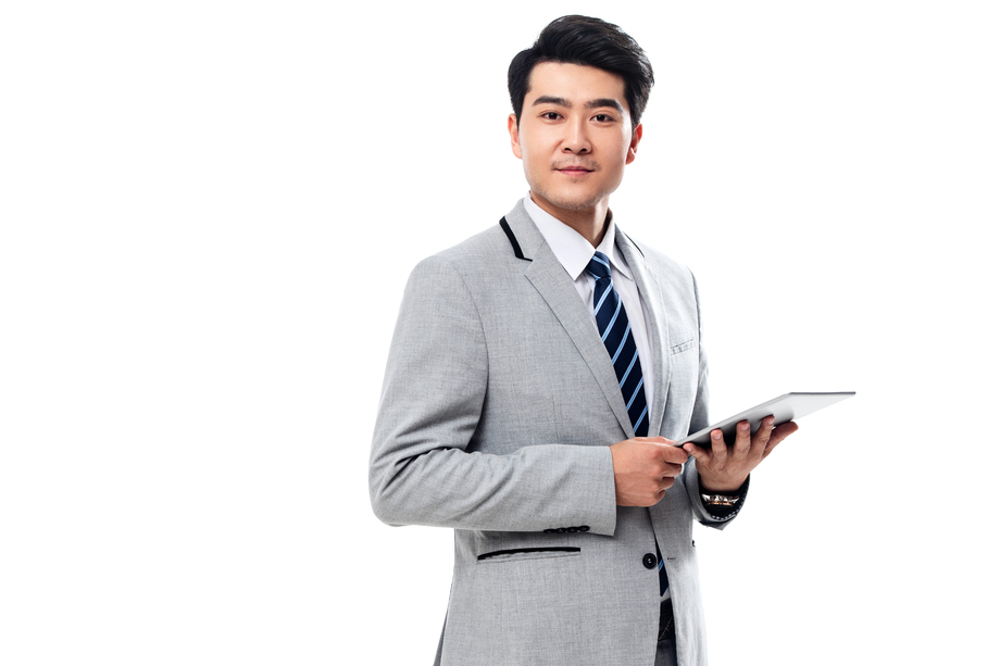 拿平板电脑的商务男士图片