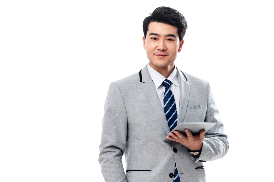 拿平板电脑的商务男士图片