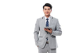 拿平板电脑的商务男士图片