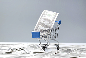 购物车和大量美国百元钞票图片