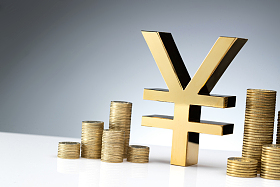 人民币符号和垒起的金币照片