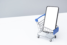 购物车和空白屏幕的手机图片