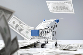 购物车和大量美国百元钞票图片