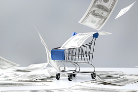 购物车和大量美国百元钞票照片