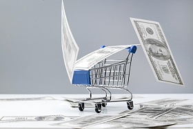 购物车和大量美国百元钞票图片