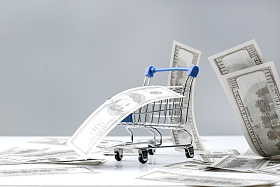 购物车和大量美国百元钞票图片