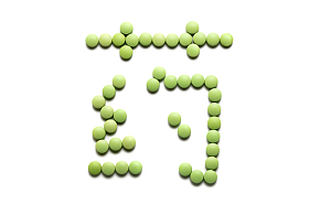 药片组成的药字照片