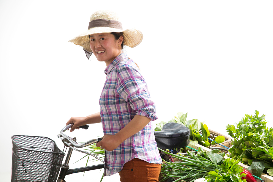菜农推着自行车图片 菜农推着自行车图片