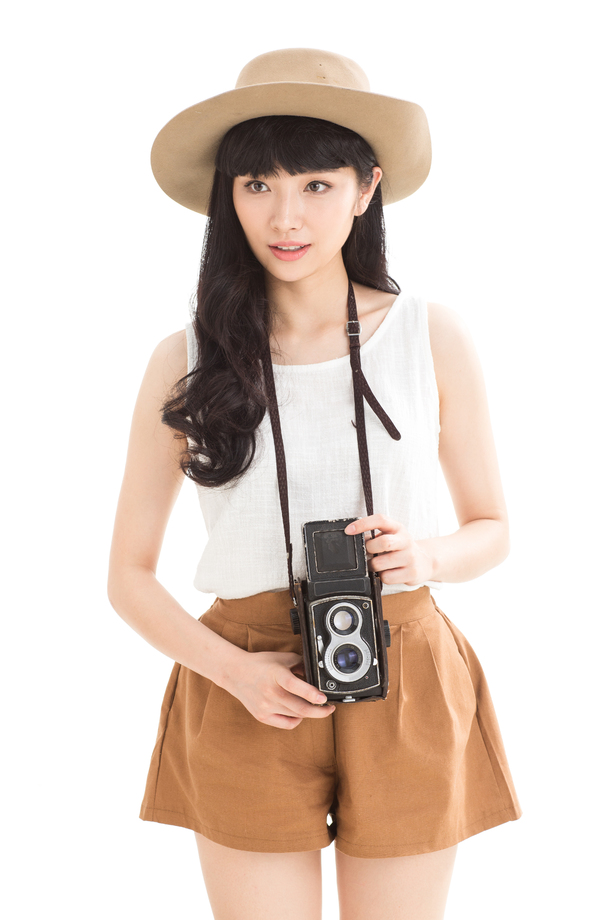 拿老式照相机的青年女人图片 拿老式照相机的青年女人图片