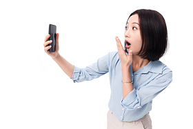 女白领看手机图片
