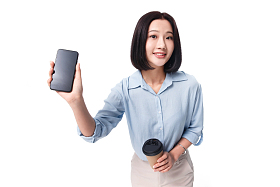 女白领手拿咖啡杯照片