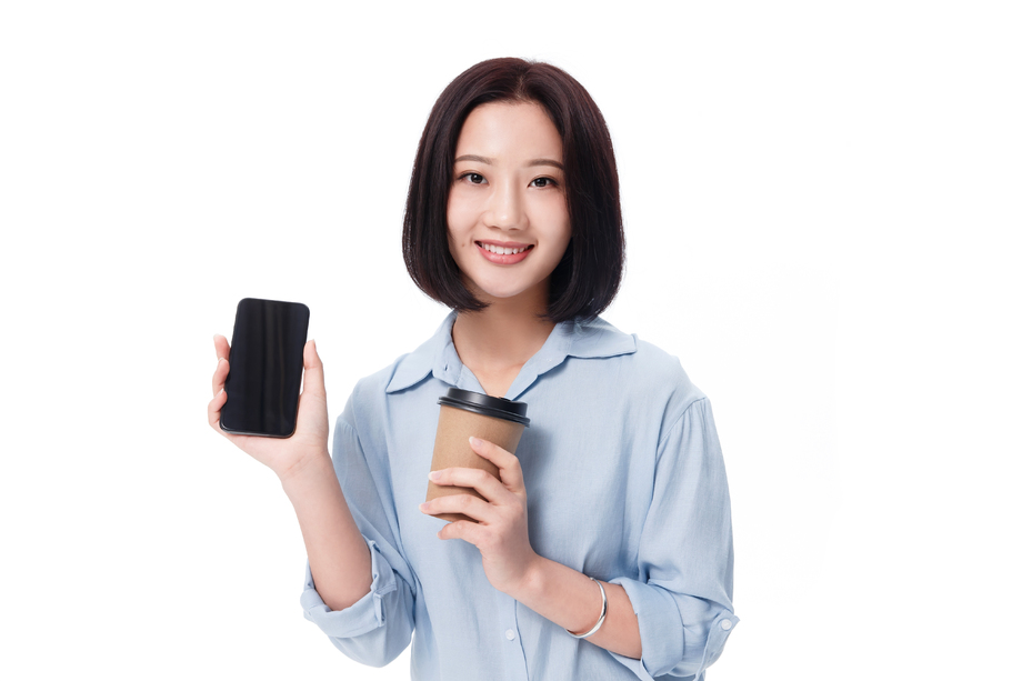 女白领手拿咖啡杯图片