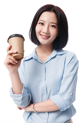 女白领手拿咖啡杯照片