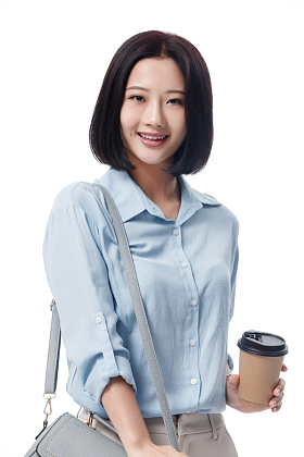 女白领手拿咖啡杯照片
