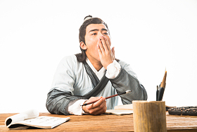 书生正在书写图片